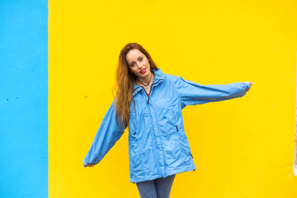 istock Cheerful woman enjoying rainy day 802944778