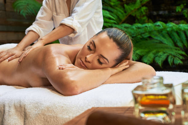 istock asian back massage theraphy spa hot stone 802947456