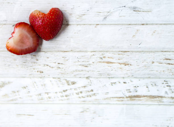 istock Strawberry on white wooden table 802966674
