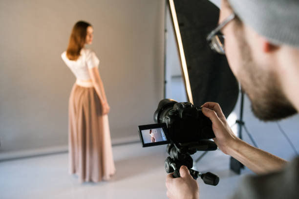 istock POV of photographer during studio session. 802976744