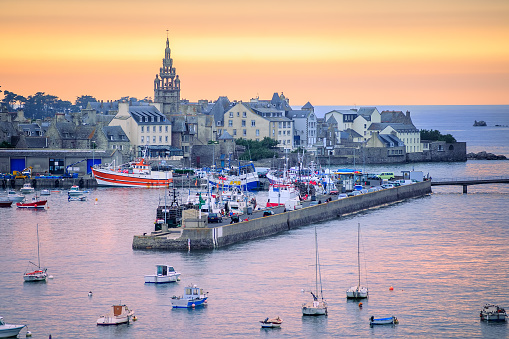 Sunset over the port of Roscoff, a popular tourist destination in Finistere departement of Brittany in northwestern France