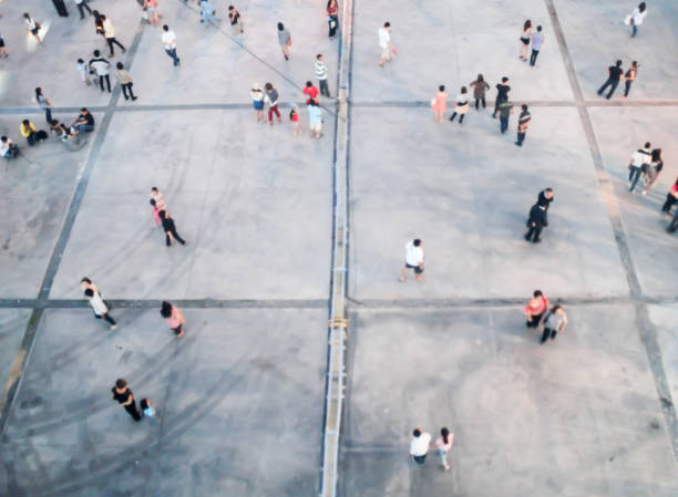 istock People blurred from top view,crowd of people bird eye view 802990834
