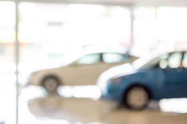 istock abstract blur car showroom 802991660