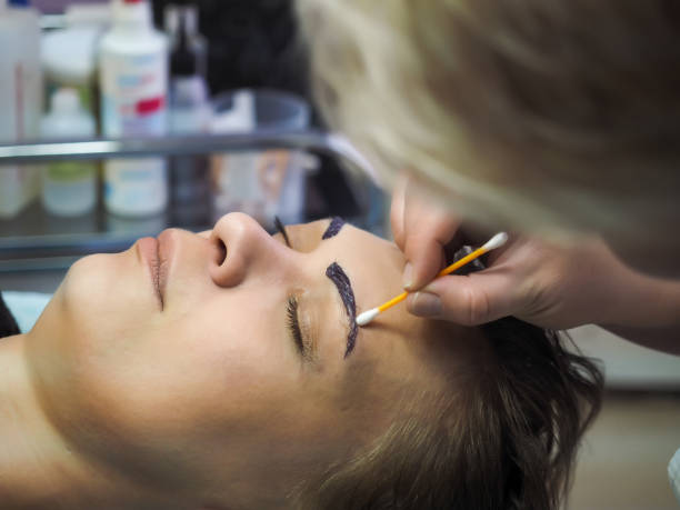 istock The procedure for colouring of eyebrows in the beauty salon 802995312