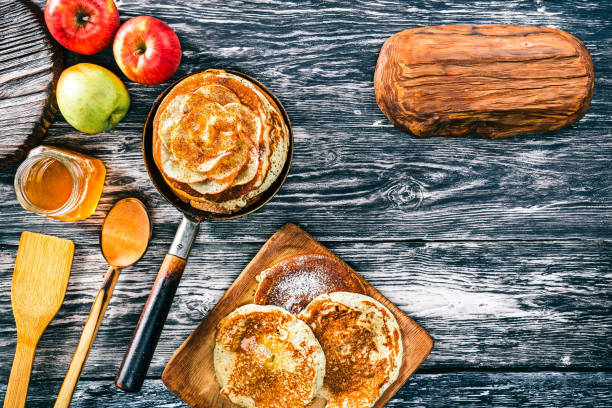 Close-up shot of mini pancake with fresh fruits and homemade yogurt in rectangular platter