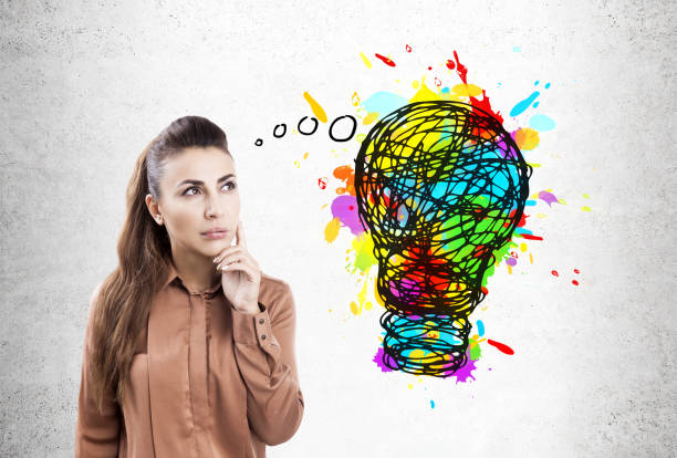 istock Pensive woman and light bulb 803000924