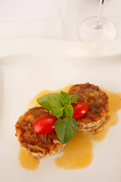 istock Moussaka arranged on a plate, Traditional dish in elegant setting, Selective focus with soft light 803002016