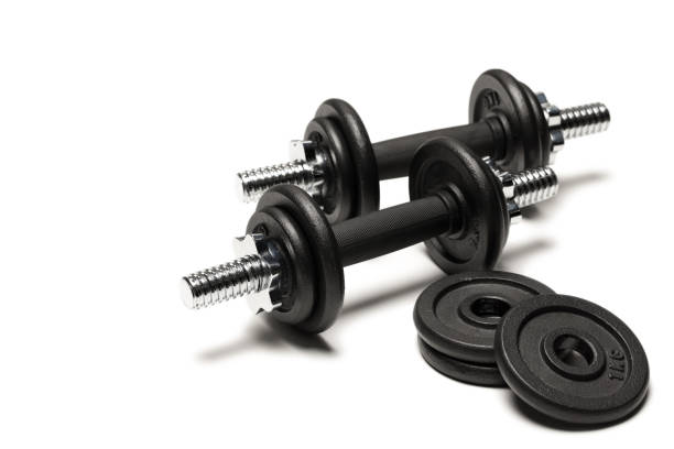 istock black iron dumbbells with weight plates isolated on white 803004704