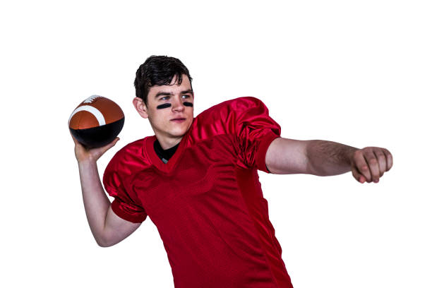 istock American football player throwing a ball 803005206