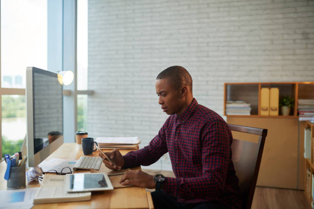 istock Concentrated Businessman at Workplace 803010920