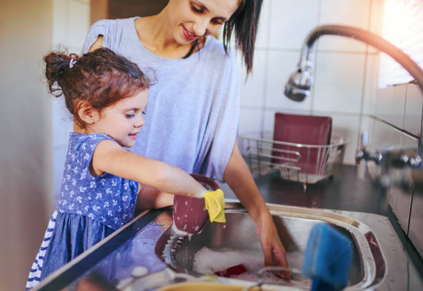 istock Chores are more fun when we do them together 803026346