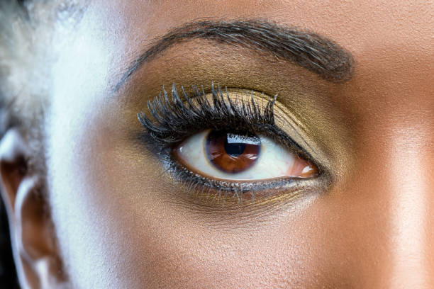 Macro close up of african eye with make up.