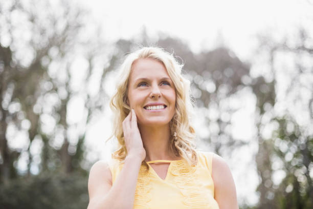 istock Cute woman smiling at camera 803040270