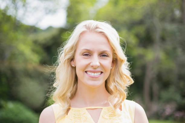 istock Cute woman smiling at camera 803040354