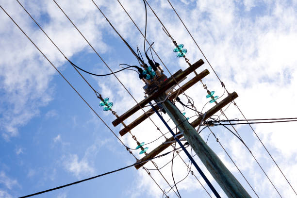 istock Suburban power lines and pole 803040474