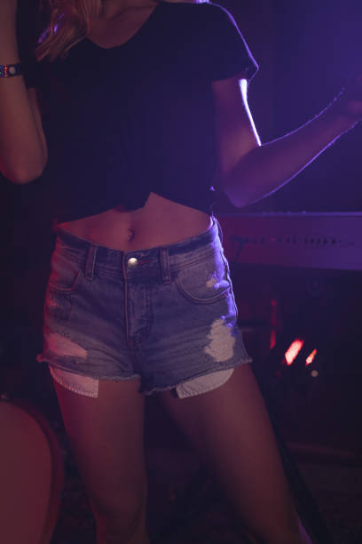 istock Female singer performing in nightclub 803057550