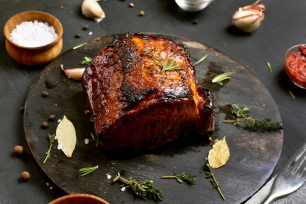 istock Grilled meat on wooden board 803062152