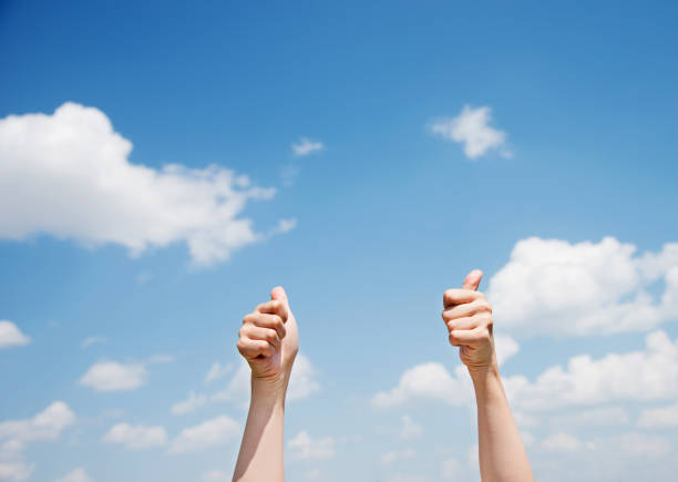 Thumbs up in the sky