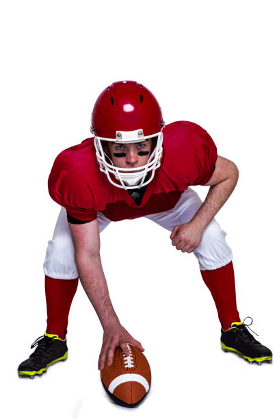istock American football player in attack stance 803062636