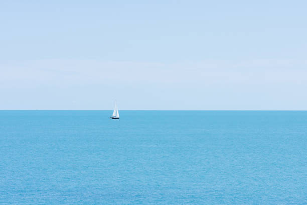 istock Boat Driving Into The Deep Sea 803067902