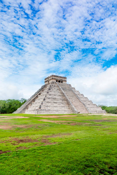 Chichen Itza Pyramids Mexico Chichen Itza is one of the most visited archaeological sites in Mexico; an estimated 1.4 million tourists visit the ruins every year. The site is a UNESCO world Heritage Site and is known for being one of the seventh wonders of the world. kukulkan pyramid photos stock pictures, royalty-free photos & images