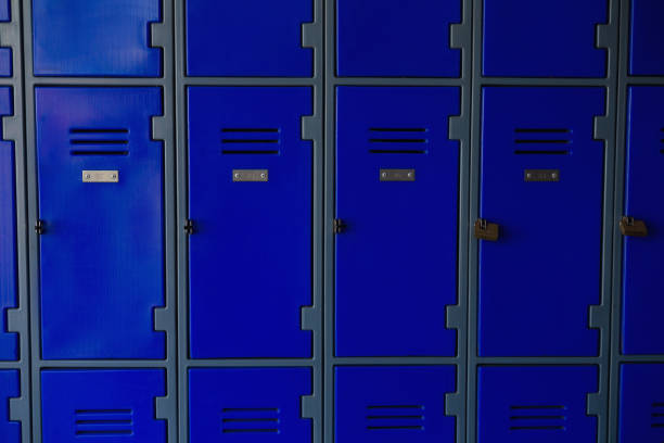 istock Close up of closed blue lockers 803072558