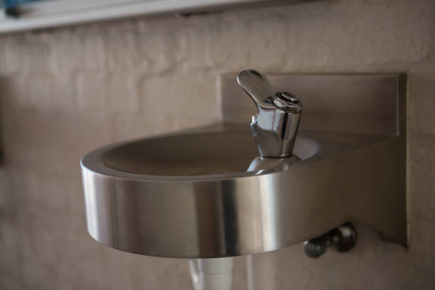 istock Close up of drinking water faucet 803072708