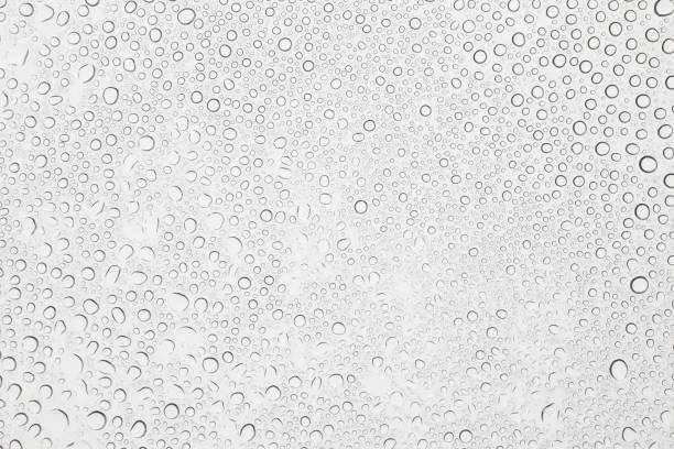 istock Water drops on glass, Rain droplets on glass background. 803073896