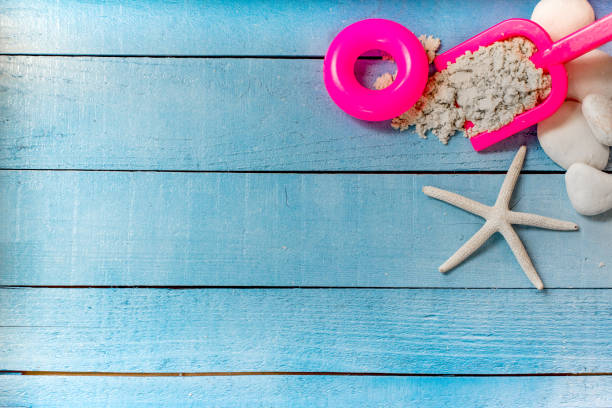 istock summer season, beach on wooden, flat lay with copy space 803086648