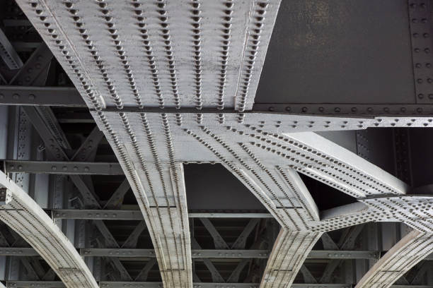 istock Urban view: small old bridges under modern automotive metal bridge 803092026
