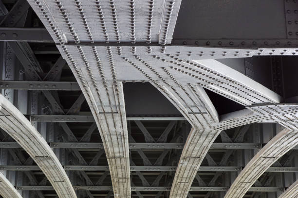 istock Urban view: small old bridges under modern automotive metal bridge 803092078
