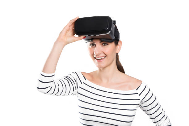 istock A beautiful woman wearing a Virtual Reality Headset 803097838