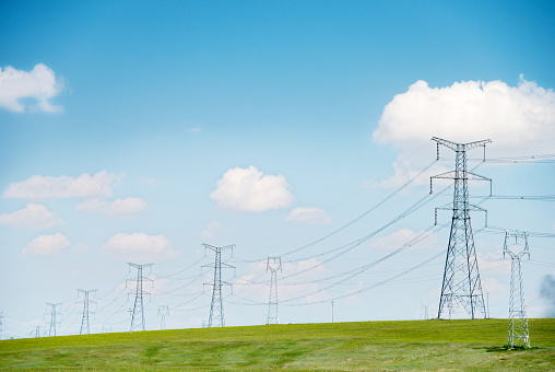 High voltage electrical towers in California country area