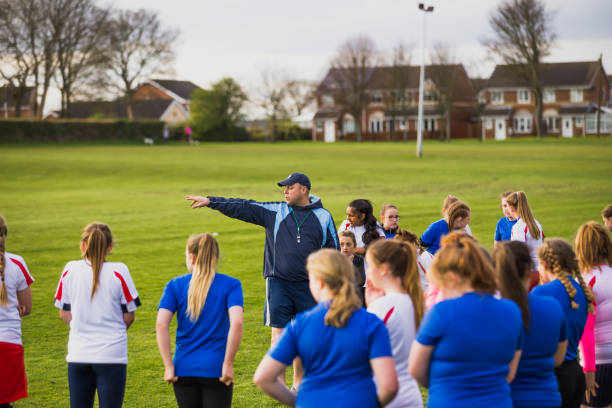istock Rugby Girls Team Huddle 803101442