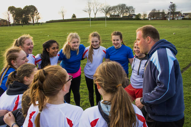 istock Rugby Girls Team Huddle 803101902