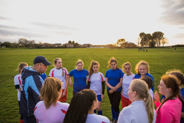 istock Rugby Girls Team Huddle 803102262