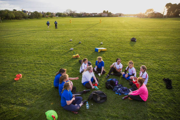 istock Rugby Girls Team Huddle 803102328