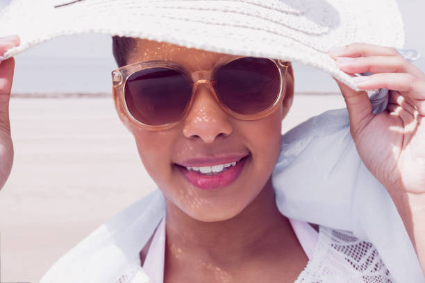 istock Stylish woman in hat and sunglasses 803104952