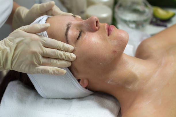istock Young client is enjoying a facial massage 803105098
