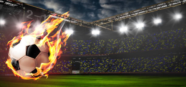 Soccer or football ball on fire at stadium