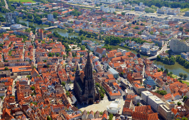 Closer Aerial view of Ulm Minster (Ulmer Münster) and Ulm, south germany on a sunny summer day Closer Aerial view of Ulm Minster (Ulmer Münster) and Ulm, south germany on a sunny summer day ulm minster stock pictures, royalty-free photos & images
