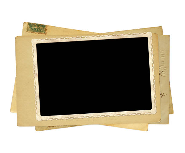istock Old post cards and old photo. Isolated on white background 803119004