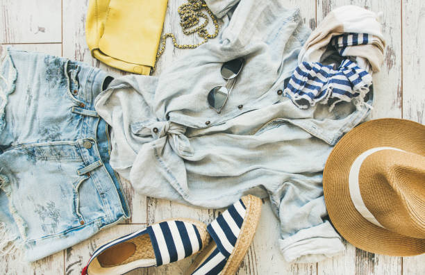 istock Pastel coloured summer women's clothes, parquet background 803119500