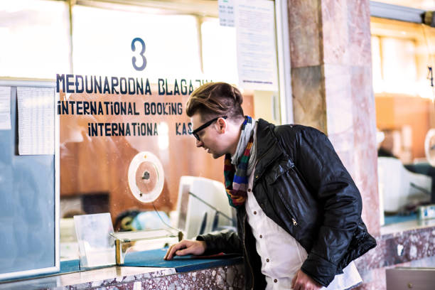 istock Young businessman at train station 803119744