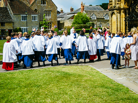 Choir Boys and Girls in their robes at Sherborne Abbey Dorset, UK