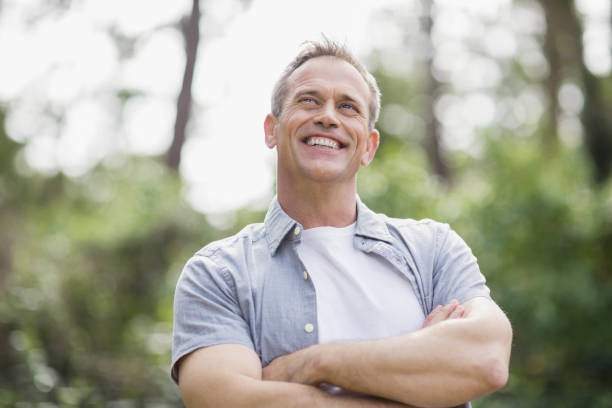 istock Smiling man crossing his arms 803138714