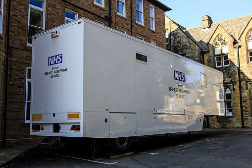 An NHS mobile breast screening unit outside the Yeatman Hospital in Sherborne, Dorset UK