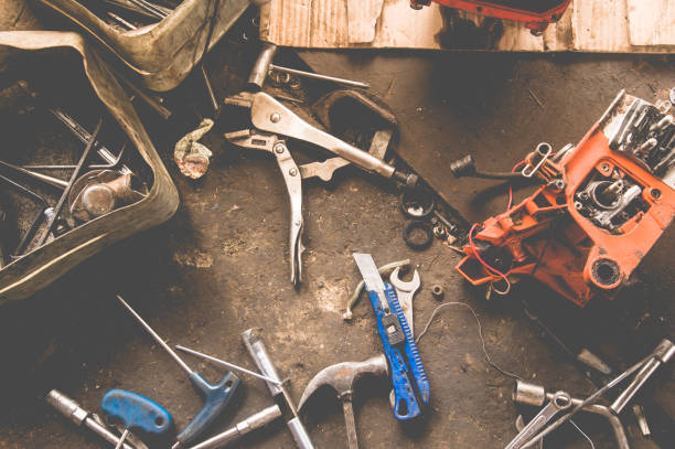 istock Many Tools on dirty floor, Set Craftsman tool , mechanical tools. Professional  mechanic using different tools for working in auto repair service. 803150422