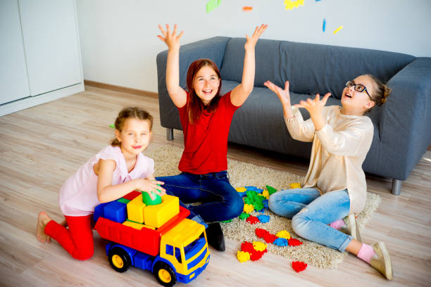 istock Girls with toy car 803171242
