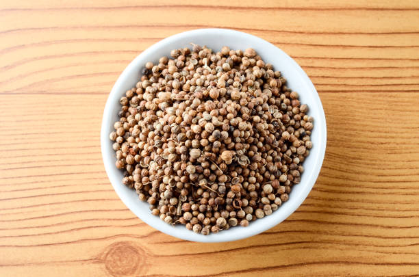 istock Spice seed in bowl over wooden background 803192918